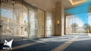 Acoustic glass windows with traditional Islamic geometric patterns in a prayer hall.